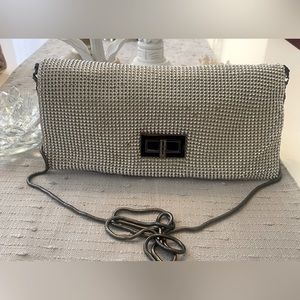 BCBG,Silver rhinestones, long chain clutch.
